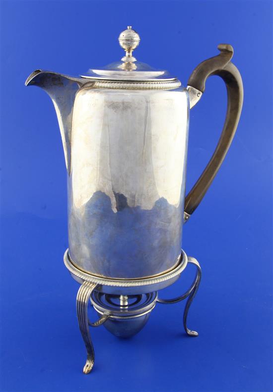 A George III silver hot water pot on stand by Robert Garrard I, gross 25 oz.